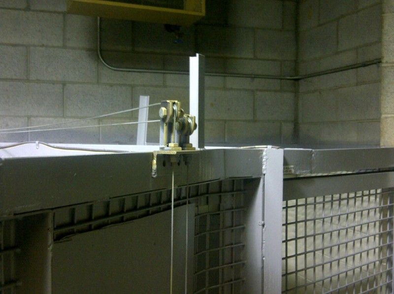 Behind the scenes view of Block’s cable pulley block system used for large and small animal cage doors at the Calgary Zoo