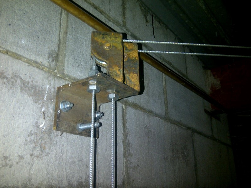 Heavy duty pulley blocks in use for animal cage doors at Calgary Zoo
