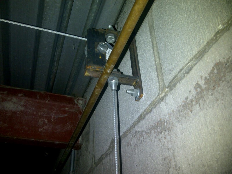 Blocks load rated pulley system securely bolted in place at the Calgary Zoo and used for animal cage doors