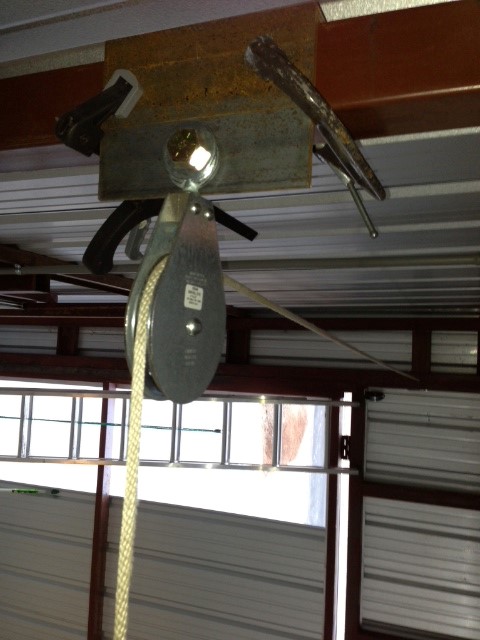 BlockDivision’s swivel eye used in large overhead hanger door assembly