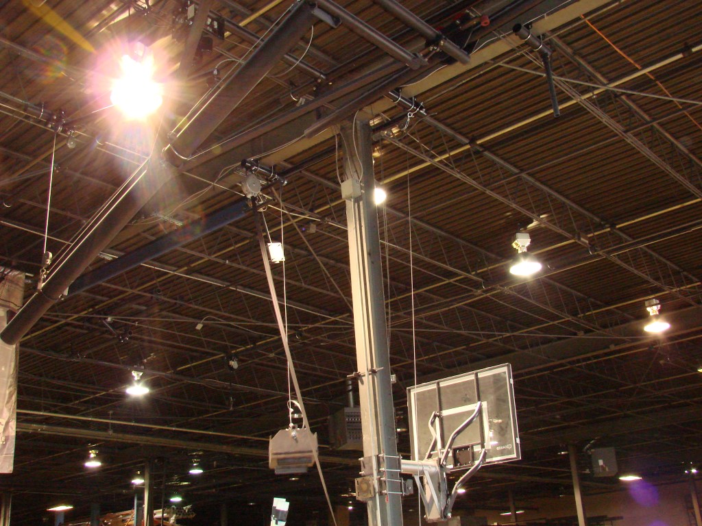 Swivel eye pulley block offers industrial strength for lifting and storing a basketball backdrop