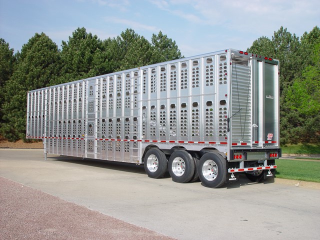 TriAz heavy duty trailer from Wilson Trailer uses BlockDivision pulley blocks for raising & lowering door ramps